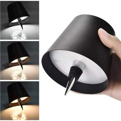 Black LED Bottle Table Lamp with Dimmable Warm Lighting held by a hand with additional images of the lampshade in use.